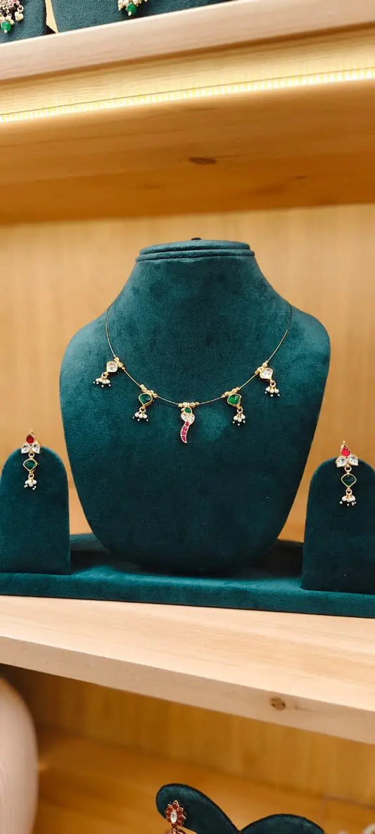 Gold-Plated peacock motif Kundan & Pearl Necklace Set Reyshaa