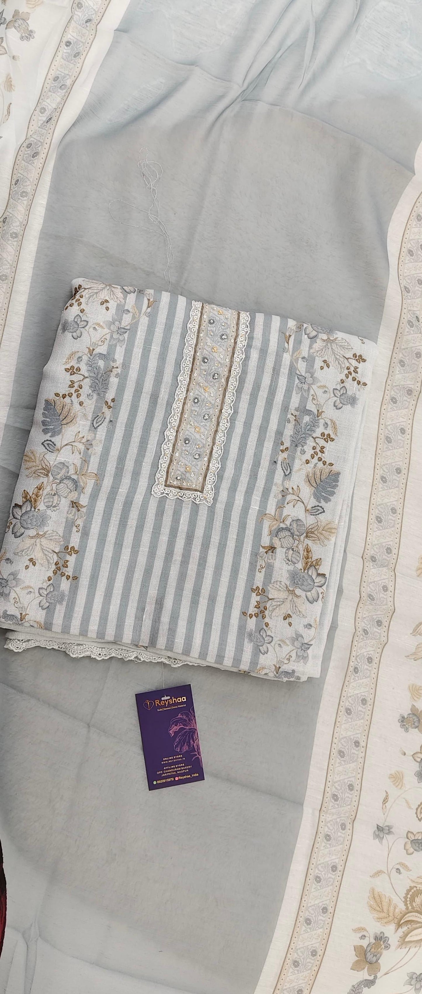 Pure linen Pakistani suit set with floral digital printing and crochet lace and embellishments.