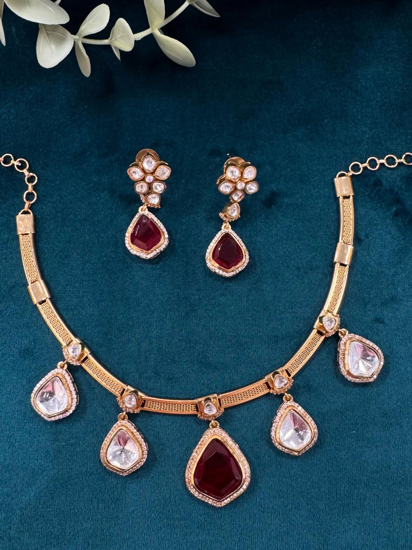 Elegant Hasli Necklace with Ruby, Uncut Polki & Kundan AD Stones. Reyshaa