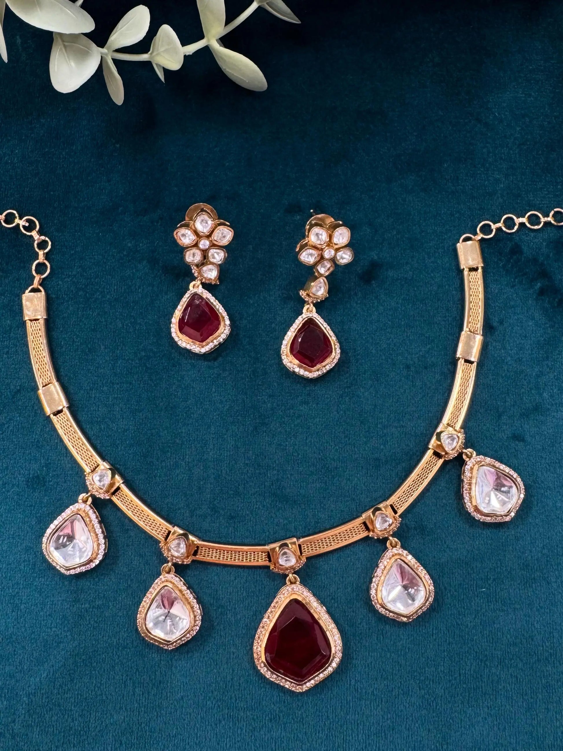 Elegant Hasli Necklace with Ruby, Uncut Polki & Kundan AD Stones. Reyshaa