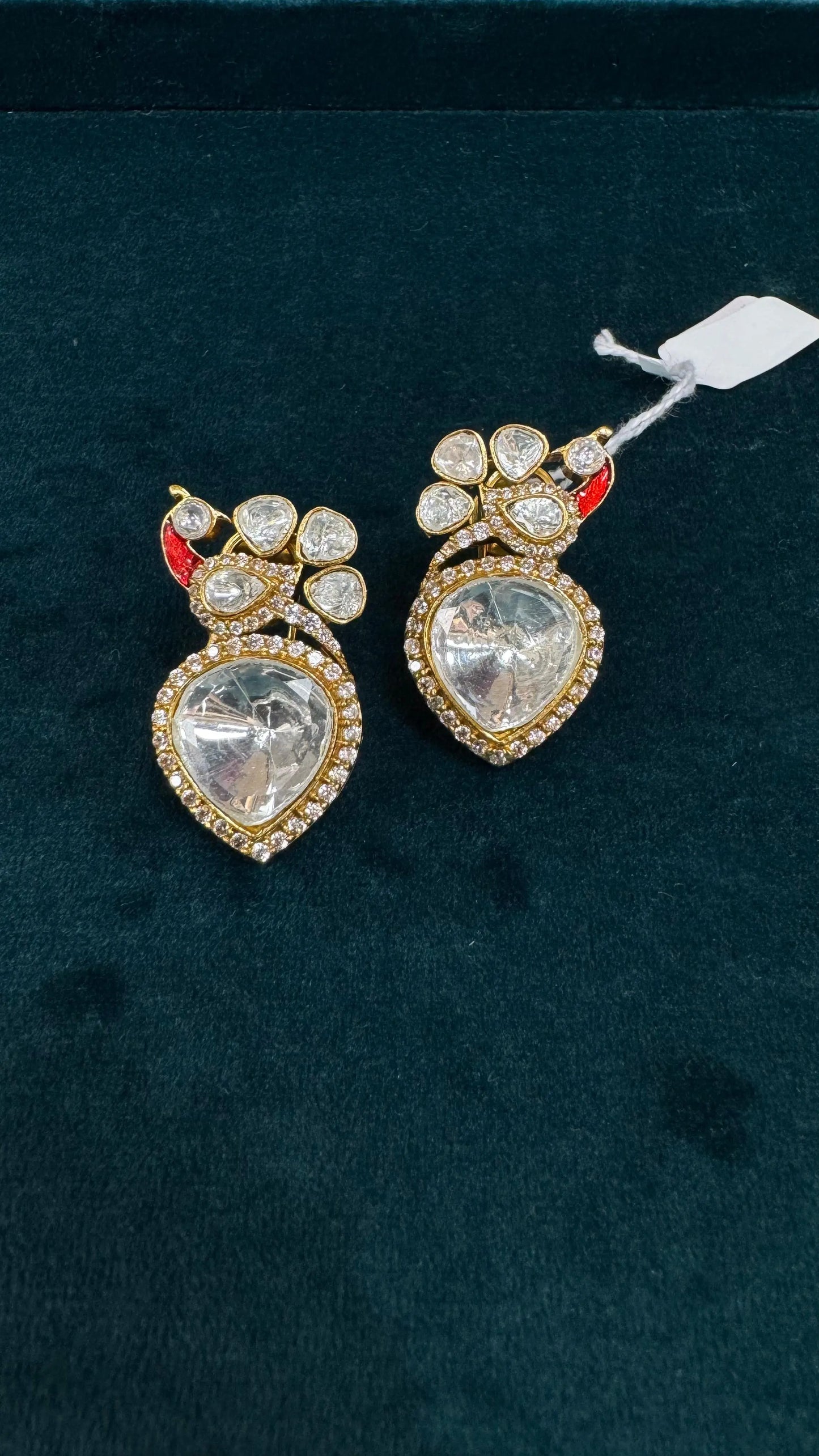 Peacock Polki Earrings with Kundan, AD Stones & Red Enamel Detailing Reyshaa