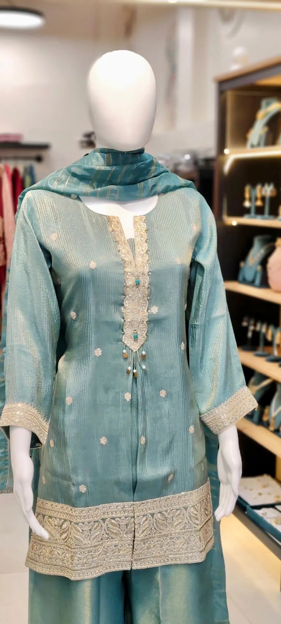 Banarasi Booti Silk Shimmer Pakistani Sharara Suit with All-Over Embroidery & Neck Tassel Tie Reyshaa