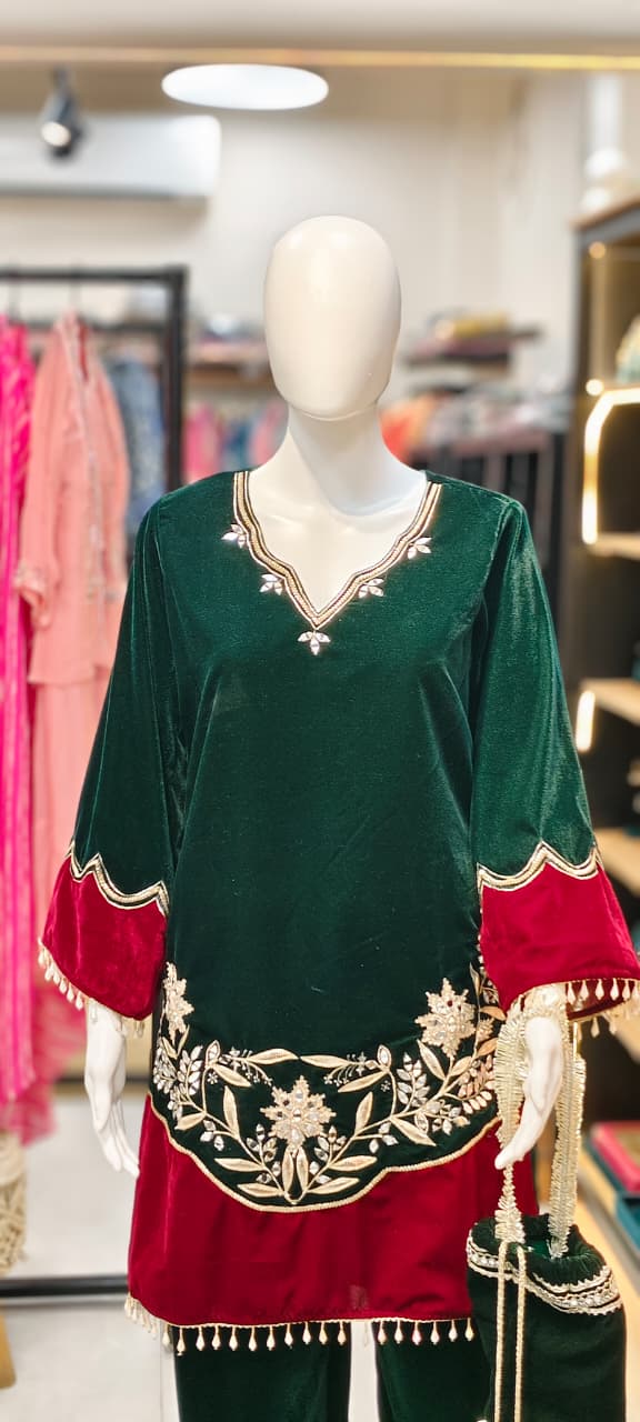 Velvet Pakistani co-ord set with tassels and heavy embroidery and matching potli Reyshaa