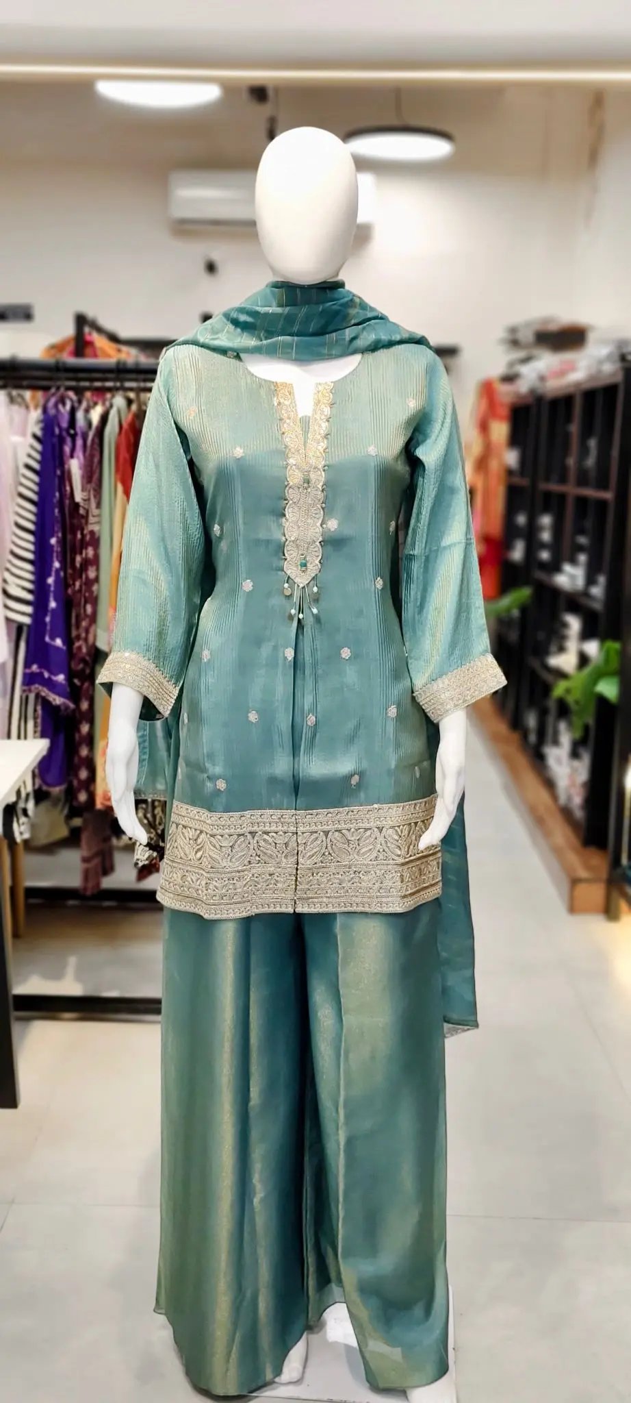 Banarasi Booti Silk Shimmer Pakistani Sharara Suit with All-Over Embroidery & Neck Tassel Tie Reyshaa