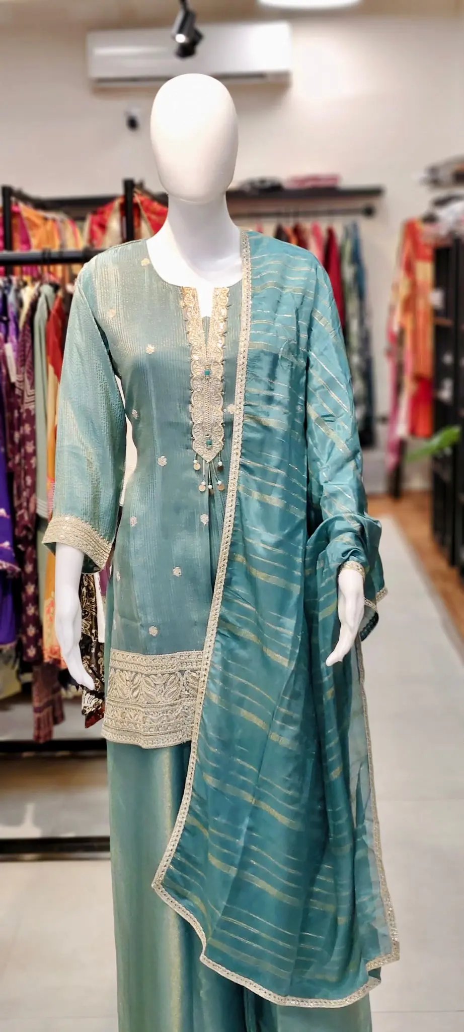Banarasi Booti Silk Shimmer Pakistani Sharara Suit with All-Over Embroidery & Neck Tassel Tie Reyshaa
