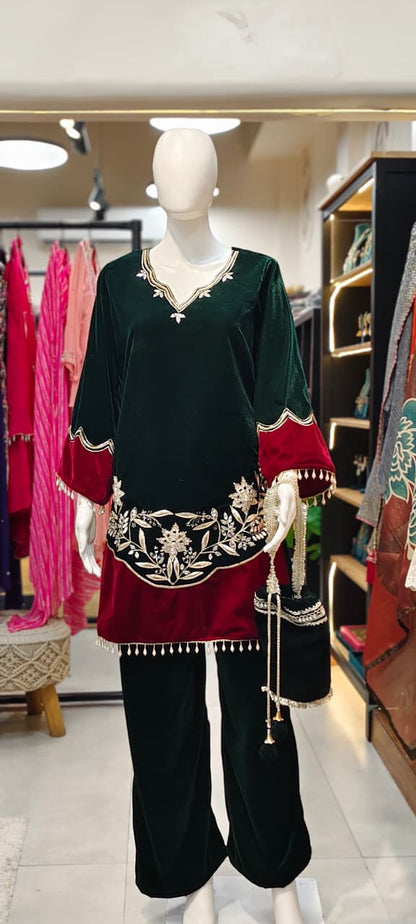 Velvet Pakistani co-ord set with tassels and heavy embroidery and matching potli Reyshaa