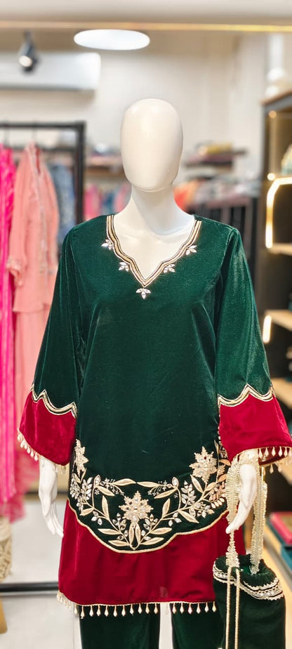 Velvet Pakistani co-ord set with tassels and heavy embroidery and matching potli Reyshaa